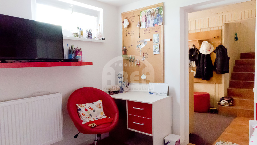 Komerčná budova s 2-izbovým bytom vo Vranove nad Topľou