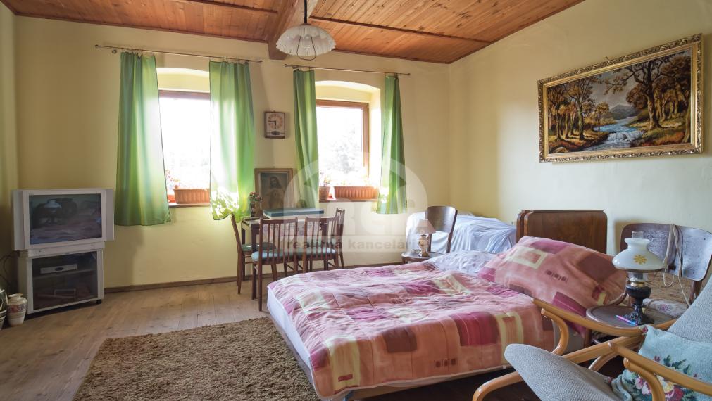 VÝRAZNÁ ZĽAVA! Útulný domček s krásnym pozemkom v obci Suché